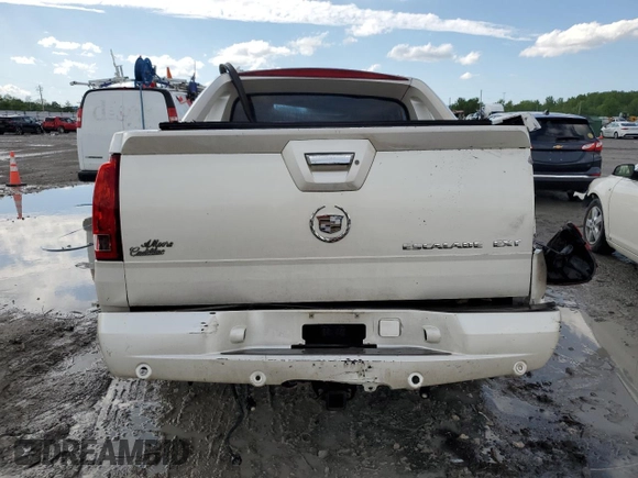 2004 Cadillac Escalade EXT z VIN 3GYEK62N84G108518, wystawiony jako Copart lot #49307055 z przebiegiem Nie podano mil oraz Szkody całkowita. Historia ofert i sprzedaży dostępna na DreamBid. Obrazek 6.
