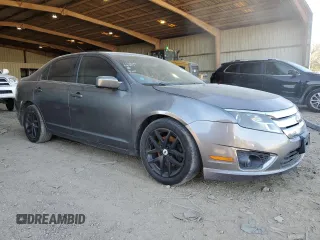 2010 Ford Fusion SEL with VIN 3FAHP0JA5AR390168, listed as a Copart auction lot 81554674 with 210,266 mi miles and Salvage Title. Bid and sale history available at DreamBid. Image 4.