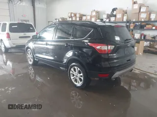 2018 Ford Escape SE with VIN 1FMCU0G99JUC89312, listed as a IAAI auction lot 41484138 with 149,739 mi miles. Bid and sale history available at carsss.com. Image 3.