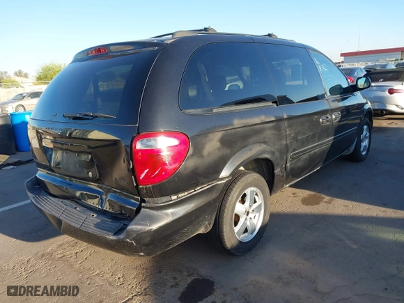 2006 Dodge Grand Caravan SXT with VIN 2D4GP44L36R630845, listed as a IAAI auction lot 42042341 with 203,675 mi miles. Bid and sale history available at carsss.com. Image 4.
