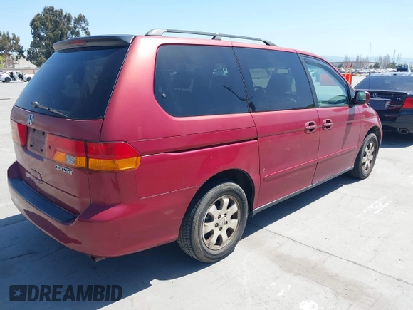 2003 Honda Odyssey EX-L with VIN 5FNRL18963B009184, listed as a IAAI auction lot 42004581 with 125,788 mi miles and . Bid and sale history available at DreamBid. Image 4.