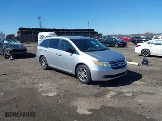 2011 Honda Odyssey EX with VIN 5FNRL5H40BB019302, listed as a IAAI auction lot 41821042 with 210,726 mi miles. Bid and sale history available at carsss.com. Image 1.