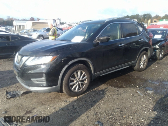 2017 Nissan Rogue SV with VIN KNMAT2MV7HP606962, listed as a IAAI auction lot 40924941 with 129,183 mi miles. Bid and sale history available at carsss.com. Image 17.