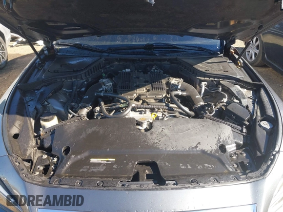 2015 Infiniti Q50 Premium z VIN JN1BV7AR9FM395574, wystawiony jako IAAI lot #40607119 z przebiegiem Nie podano mil oraz . Historia ofert i sprzedaży dostępna na DreamBid. Obrazek 10.