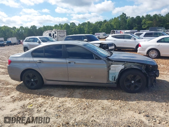 2013 BMW 5 Series 528i with VIN WBAXG5C52DD230133, listed as a IAAI auction lot 42451693 with 131,892 mi miles and . Bid and sale history available at DreamBid. Image 14.