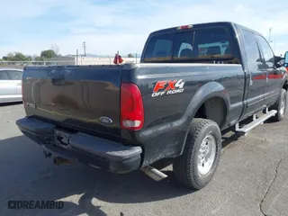 2004 Ford Super Duty F-250 XL with VIN 1FTNW21S64EB78472, listed as a IAAI auction lot 41425254 with 223,826 mi miles. Bid and sale history available at carsss.com. Image 4.