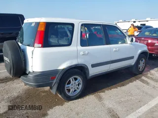 1999 Honda CR-V EX with VIN JHLRD1864XC003571, listed as a IAAI auction lot 42091015 with 177,176 mi miles. Bid and sale history available at carsss.com. Image 4.