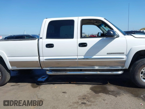 2004 GMC Sierra 2500HD SLE z VIN 1GTHK23U94F238875, wystawiony jako IAAI lot #42162219 z przebiegiem Nie podano mil oraz . Historia ofert i sprzedaży dostępna na DreamBid. Obrazek 13.