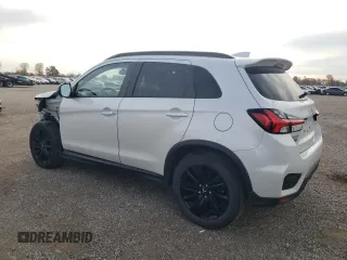 2022 Mitsubishi Outlander Sport SE z VIN JA4AJVAW2NU606282, wystawiony jako Copart lot #73378103 z przebiegiem 21 230 mil mil oraz . Historia ofert i sprzedaży dostępna na DreamBid. Obrazek 2.