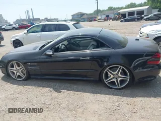 2005 Mercedes-Benz SL 55 AMG with VIN WDBSK74F85F101039, listed as a IAAI auction lot 42812397 with 76,452 mi miles and . Bid and sale history available at DreamBid. Image 14.