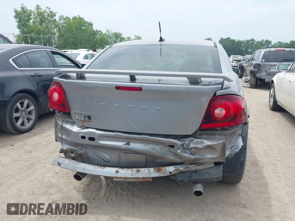 2014 Dodge Avenger SE with VIN 1C3CDZAG1EN217878, listed as a IAAI auction lot 42658793 with 172,079 mi miles and . Bid and sale history available at DreamBid. Image 6.