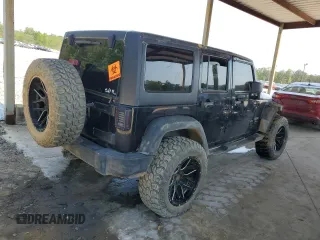 2011 Jeep Wrangler Unlimited Sport with VIN 1J4HA3H19BL574932, listed as a Copart auction lot 53250465 with 113,344 mi miles and Salvage Title. Bid and sale history available at carsss.com. Image 3.
