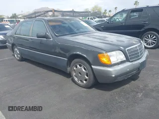 1992 Mercedes-Benz 500 z VIN WDBGA51E0NA023491, wystawiony jako IAAI lot #42058835 z przebiegiem 260 421 mil mil oraz . Historia ofert i sprzedaży dostępna na DreamBid. Obrazek 1.