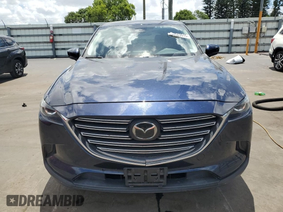 2018 Mazda CX-9 Touring with VIN JM3TCBCY3J0235048, listed as a Copart auction lot 61043915 with 82,869 mi miles and Salvage title. Bid and sale history available at DreamBid. Image 5.