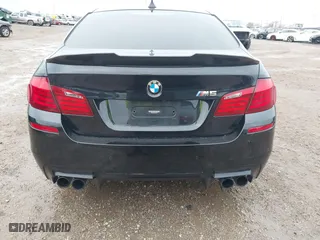 2013 BMW M5 with VIN WBSFV9C51DD095750, listed as a IAAI auction lot 40907304 with 93,014 mi miles. Bid and sale history available at carsss.com. Image 16.