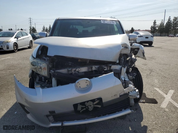 2012 Scion xB with VIN JTLZE4FE3C1143496, listed as a Copart auction lot 52157215 with 223,376 mi miles and Salvage Title. Bid and sale history available at carsss.com. Image 5.