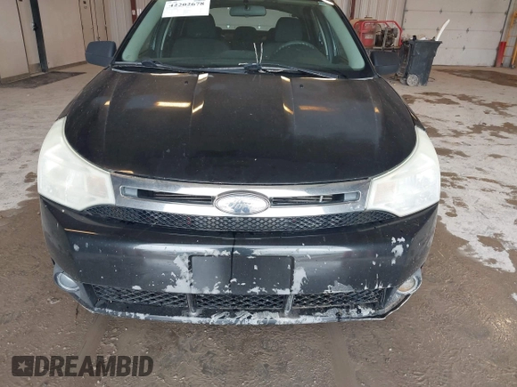 2009 Ford Focus SE with VIN 1FAHP35N69W128084, listed as a IAAI auction lot 42202678 with 290,358 mi miles. Bid and sale history available at carsss.com. Image 6.