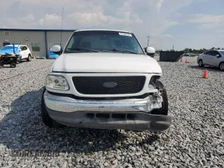 2002 Ford F-150 XL with VIN 1FTRX17272NB01218, listed as a Copart auction lot 61336795 with 201,972 mi miles and Salvage title. Bid and sale history available at DreamBid. Image 5.