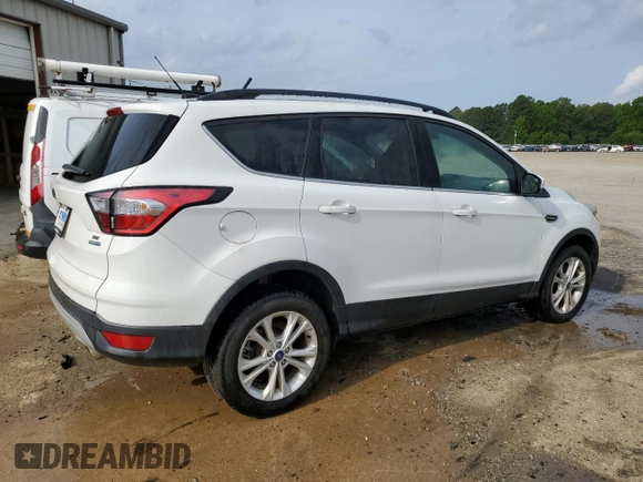 2018 Ford Escape SE z VIN 1FMCU9GD5JUB29050, wystawiony jako Copart lot #55166745 z przebiegiem 79 939 mil mil oraz Czysty tytuł • Clean title. Historia ofert i sprzedaży dostępna na DreamBid. Obrazek 3.