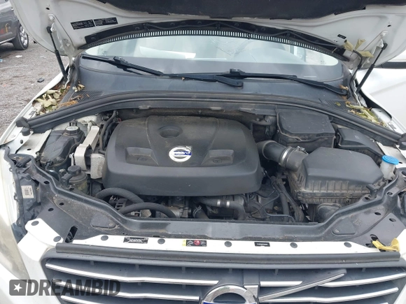 2015 Volvo XC60 T5 Drive-E Premier z VIN YV440MDB9F2622367, wystawiony jako IAAI lot #42356051 z przebiegiem 194 999 mil mil oraz . Historia ofert i sprzedaży dostępna na DreamBid. Obrazek 10.