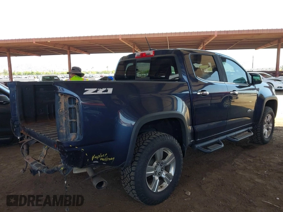2018 Chevrolet Colorado 4WD Z71 z VIN 1GCGTDEN9J1231315, wystawiony jako IAAI lot #42440943 z przebiegiem 171 061 mil mil oraz . Historia ofert i sprzedaży dostępna na DreamBid. Obrazek 4.