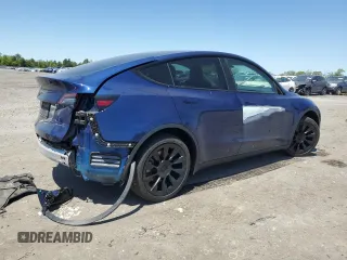 2022 Tesla Model Y Long Range z VIN 7SAYGDEEXNF444122, wystawiony jako Copart lot #54344735 z przebiegiem 33 230 mil mil oraz Szkody całkowita. Historia ofert i sprzedaży dostępna na DreamBid. Obrazek 3.