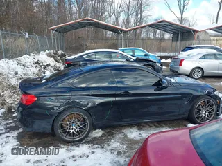 2017 BMW M4 with VIN WBS3R9C51HK709916, listed as a IAAI auction lot 41223578 with 24,225 mi miles. Bid and sale history available at carsss.com. Image 14.
