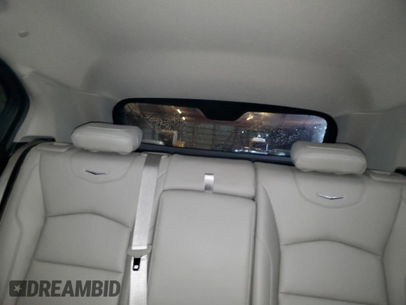 2022 Cadillac XT4 FWD Luxury z VIN 1GYAZAR48NF163967, wystawiony jako Copart lot #43148925 z przebiegiem 58 788 mil mil oraz Czysty tytuł • Clean title. Historia ofert i sprzedaży dostępna na DreamBid. Obrazek 10.