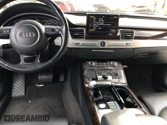 2012 Audi A8 с VIN WAUAVAFD2CN028862, выставлен на аукционе Copart как лот 80295204 с пробегом 162 752 миль миль и Чистый • Clean title. История ставок и продаж доступна на DreamBid. Изображение 9.