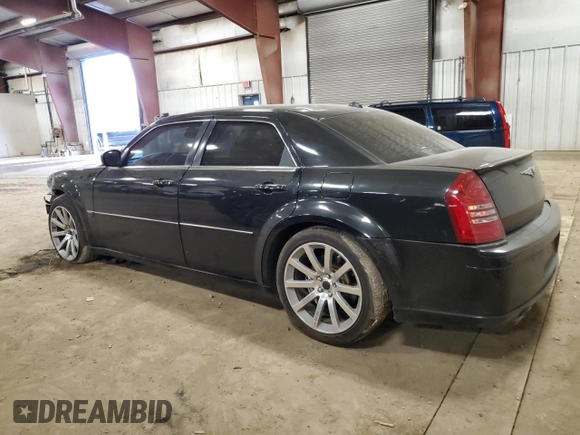 2006 Chrysler 300 C SRT8 with VIN 2C3LA73WX6H106631, listed as a Copart auction lot 50715715 with 104,990 mi miles and Clean Title. Bid and sale history available at carsss.com. Image 2.
