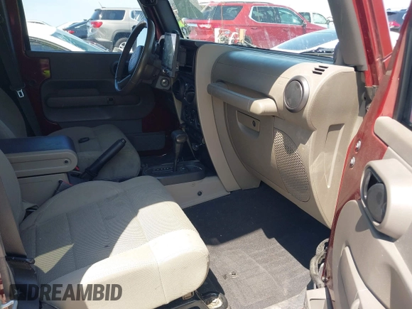 2007 Jeep Wrangler Unlimited Sahara with VIN 1J4GA59187L116585, listed as a IAAI auction lot 41996297 with 151,961 mi miles and . Bid and sale history available at DreamBid. Image 5.