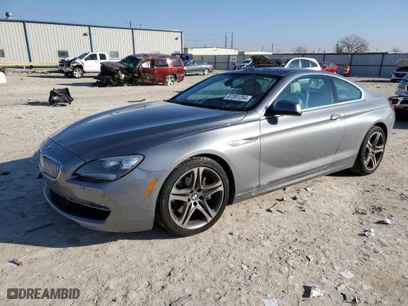 2012 BMW 6 Series 650i xDrive with VIN WBALX5C52CC894497, listed as a Copart auction lot 87381254 with 103,753 mi miles and Salvage Title. Bid and sale history available at carsss.com. Image 1.