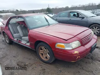 2002 Ford Crown Victoria LX z VIN 2FAFP74W82X148324, wystawiony jako IAAI lot #41565717 z przebiegiem 114 536 mil mil oraz . Historia ofert i sprzedaży dostępna na DreamBid. Obrazek 1.