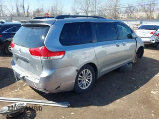 2013 Toyota Sienna XLE AAS with VIN 5TDYK3DC9DS304059, listed as a IAAI auction lot 41883196 with 170,842 mi miles and . Bid and sale history available at DreamBid. Image 4.