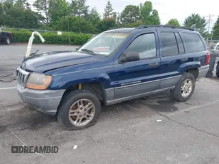 2002 Jeep Grand Cherokee Laredo with VIN 1J4GX48S02C125258, listed as a IAAI auction lot 42388724 with 295,270 mi miles and . Bid and sale history available at DreamBid. Image 17.