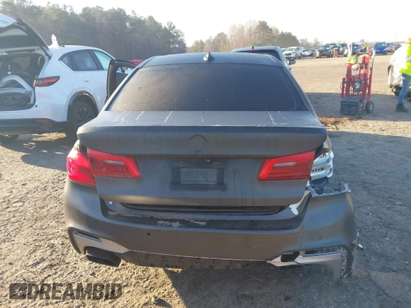 2019 BMW 5 Series M550i xDrive with VIN WBAJB9C50KB464159, listed as a IAAI auction lot 41758879 with 9,000 mi miles and . Bid and sale history available at DreamBid. Image 17.