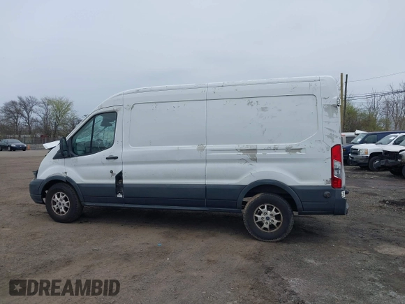 2015 Ford Transit Cargo z VIN 1FTNR2CM4FKA84584, wystawiony jako IAAI lot #42008193 z przebiegiem 224 453 mil mil oraz . Historia ofert i sprzedaży dostępna na DreamBid. Obrazek 14.