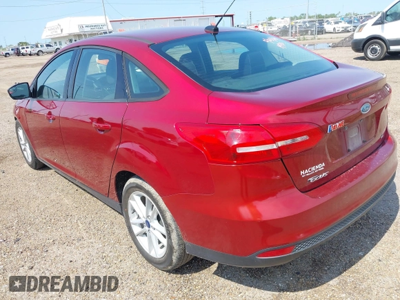 2017 Ford Focus SE with VIN 1FADP3F23HL303314, listed as a IAAI auction lot 42361730 with 68,746 mi miles and . Bid and sale history available at DreamBid. Image 3.