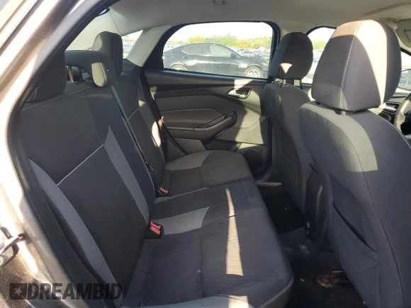 2013 Ford Focus SE z VIN 1FADP3F22DL233878, wystawiony jako Copart lot #52598475 z przebiegiem 131 539 mil mil oraz Szkoda całkowita • Salvage title. Historia ofert i sprzedaży dostępna na DreamBid. Obrazek 10.