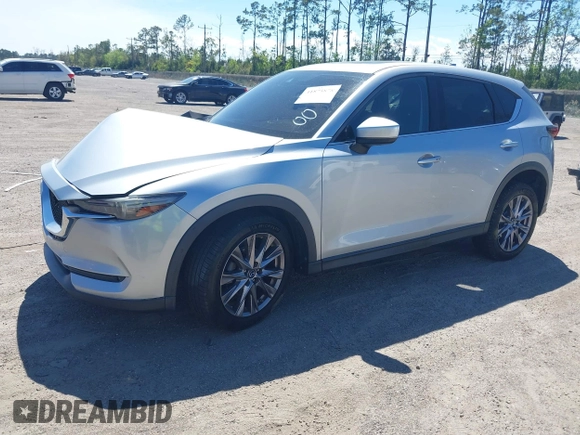 2019 Mazda CX-5 Grand Touring with VIN JM3KFADM1K1606082, listed as a IAAI auction lot 41875878 with 66,089 mi miles. Bid and sale history available at carsss.com. Image 17.