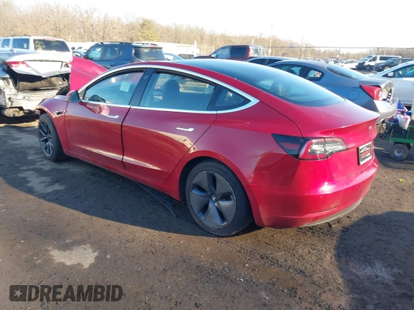 2018 Tesla Model 3 Long Range Battery with VIN 5YJ3E1EB4JF065581, listed as a IAAI auction lot 41542190 with 4,154 mi miles and . Bid and sale history available at DreamBid. Image 3.