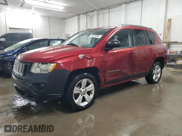 2012 Jeep Compass Sport with VIN 1C4NJCBB0CD640158, listed as a Copart auction lot 83050984 with 126,317 mi miles and Salvage Title. Bid and sale history available at carsss.com. Image 1.
