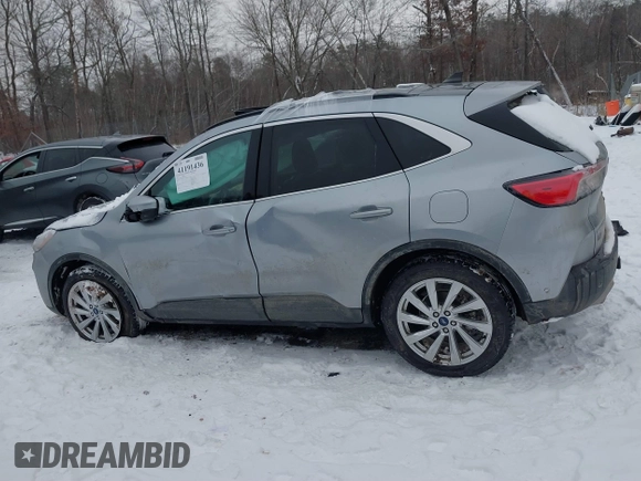 2021 Ford Escape Titanium Hybrid with VIN 1FMCU9DZXMUA01732, listed as a IAAI auction lot 41191436 with 41,116 mi miles and . Bid and sale history available at DreamBid. Image 14.