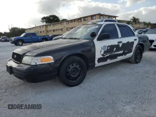 2005 Ford Police Interceptor with VIN 2FAFP71W35X128684, listed as a Copart auction lot 54002165 with 144,766 mi miles and Clean title. Bid and sale history available at DreamBid. Image 1.
