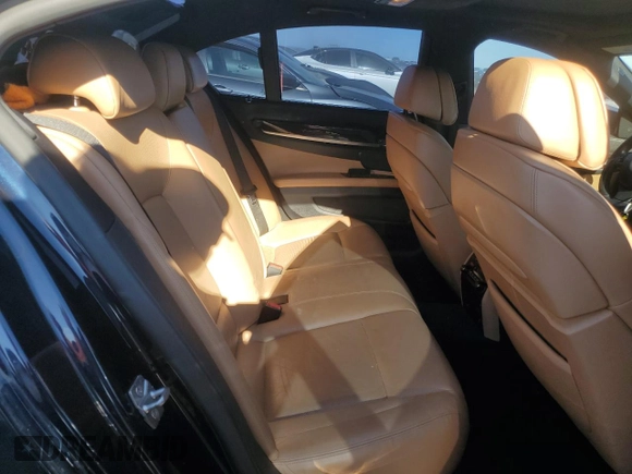 2012 BMW 7 Series 750i z VIN WBAKA8C52CCY37618, wystawiony jako Copart lot #87510215 z przebiegiem 113 512 mil mil oraz Czysty tytuł • Clean title. Historia ofert i sprzedaży dostępna na DreamBid. Obrazek 10.