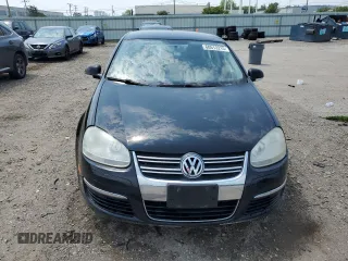 2009 Volkswagen Jetta S with VIN 3VWJM71K69M154382, listed as a Copart auction lot 60513215 with 193,278 mi miles and Salvage title. Bid and sale history available at DreamBid. Image 5.