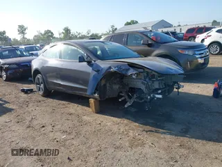 2023 Tesla Model 3 with VIN 5YJ3E1EA8PF488065, listed as a IAAI auction lot 42560445 with Not provided miles and . Bid and sale history available at DreamBid. Image 1.