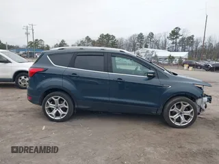 2019 Ford Escape Titanium with VIN 1FMCU9J93KUB84831, listed as a IAAI auction lot 41514146 with 105,072 mi miles. Bid and sale history available at carsss.com. Image 13.