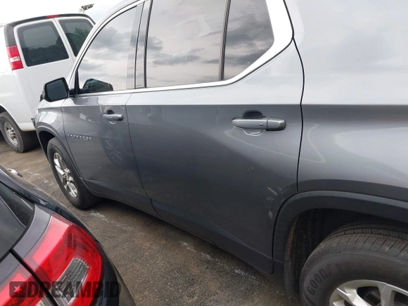 2020 Chevrolet Traverse LS with VIN 1GNERFKW5LJ245009, listed as a IAAI auction lot 42029854 with 77,771 mi miles and . Bid and sale history available at DreamBid. Image 14.