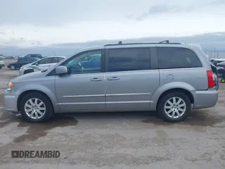 2016 Chrysler Town & Country Touring with VIN 2C4RC1BG0GR213058, listed as a IAAI auction lot 41910462 with 125,013 mi miles and . Bid and sale history available at DreamBid. Image 14.